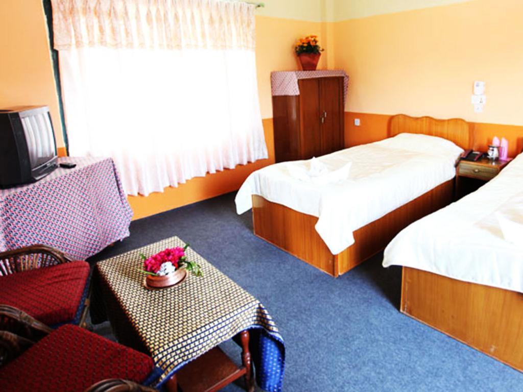 بوكْرا Trekkers Lodge الغرفة الصورة